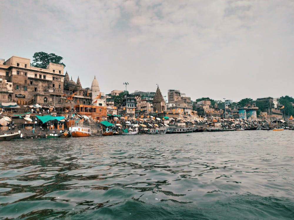 Photo by Ravi Jha from Pexels: https://www.pexels.com/photo/waterfront-buildings-in-varanasi-by-the-ganges-india-12112985/